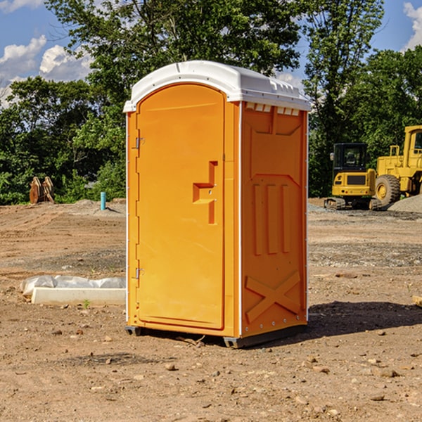 how often are the portable restrooms cleaned and serviced during a rental period in Lisbon